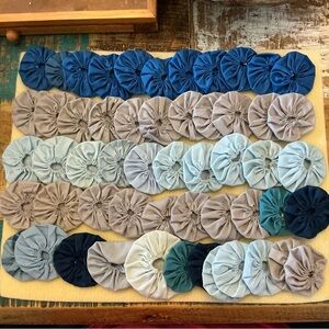 Handmade vintage Fabric Yo-Yo Quilt Pieces, total of 50!